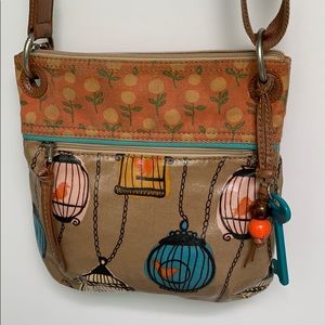 Used Key-per Fossil bird cage purse